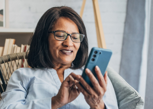 Mature woman using mobile phone 