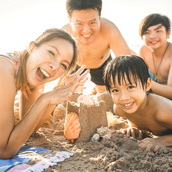 Family on vacation at the beach