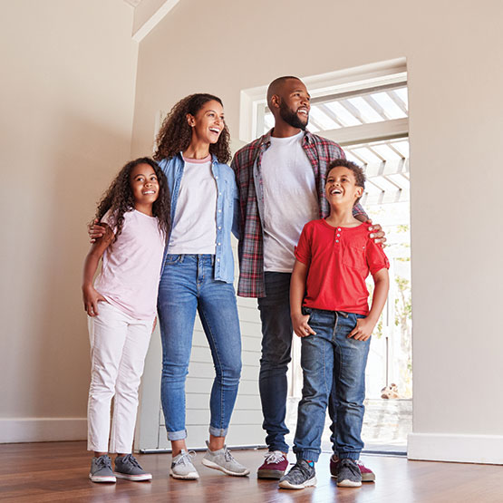 Family admiring their new home.