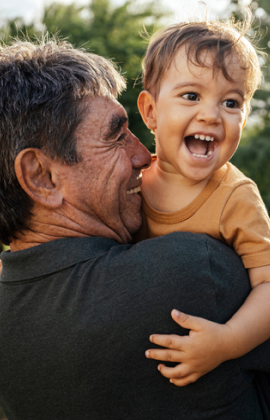 Man with grandson smiling