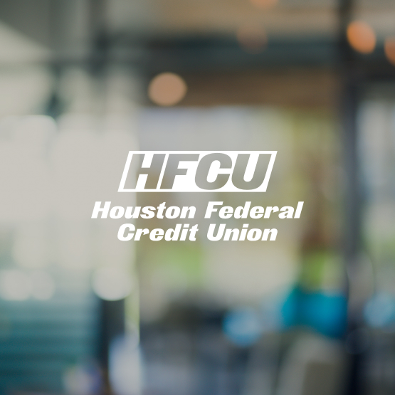 blurred office background with white HFCU logo on top