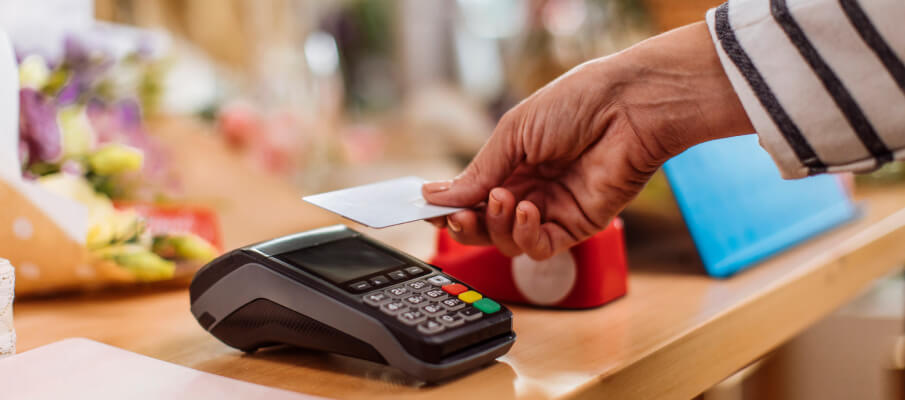 Person using card payment at business