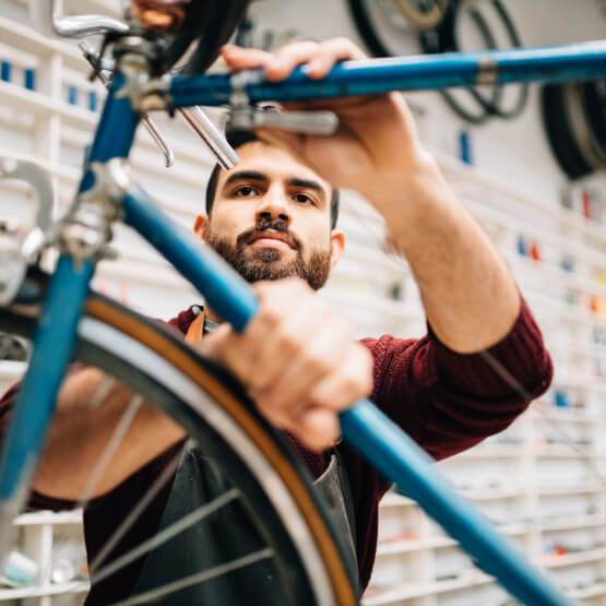 Person repairing a bike 